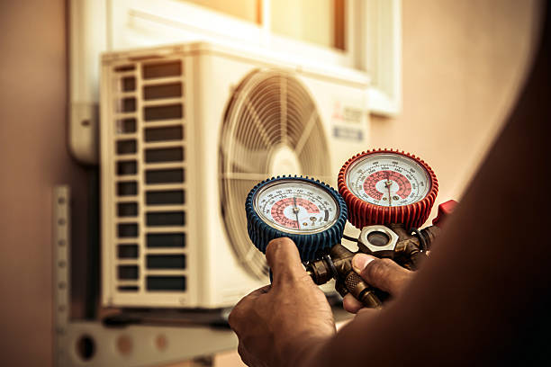 Professional Emergency Hvac technician working in Oxford, IA